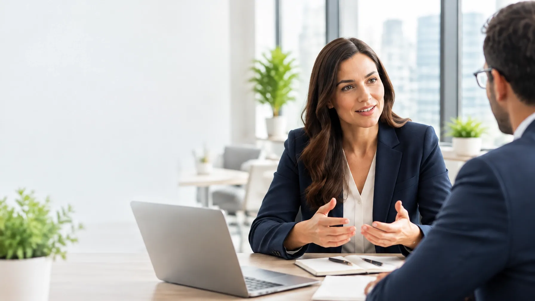 A business consultant discussing growth with a small-business owner